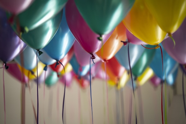 Beautifully decorated children's birthday party setup with balloons
